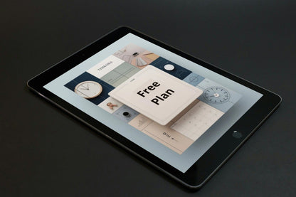 Tablet displaying a free plan offer on a dark background