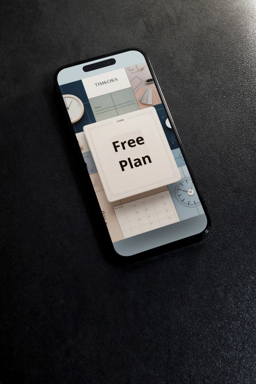 Phone screen displaying a free plan offer on a dark surface